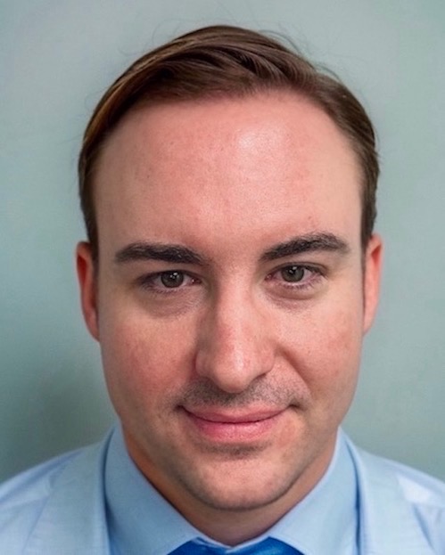 Daniel Benson, founding attorney of Michigan Trust & Estate Planning, in his Okemos office